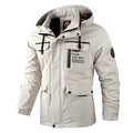 Chaqueta de invierno impermeable para hombre con capucha y forro cálido